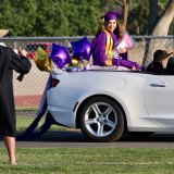 Mariah Gomez waves to a faculty member Thursday night.